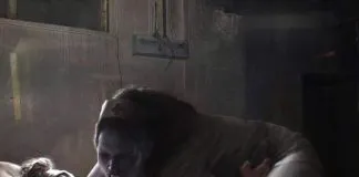 What does it mean when you feel like someone is holding you down in your sleep?